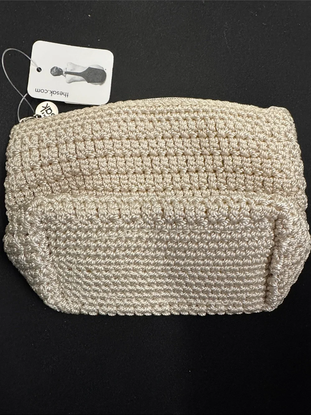 The Sak Cream Woven Zip Clutch